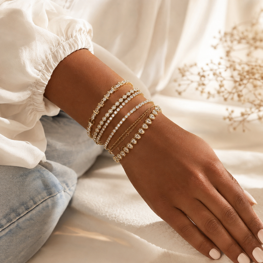 Personalized tennis bracelet styled in a luxury bracelet stack