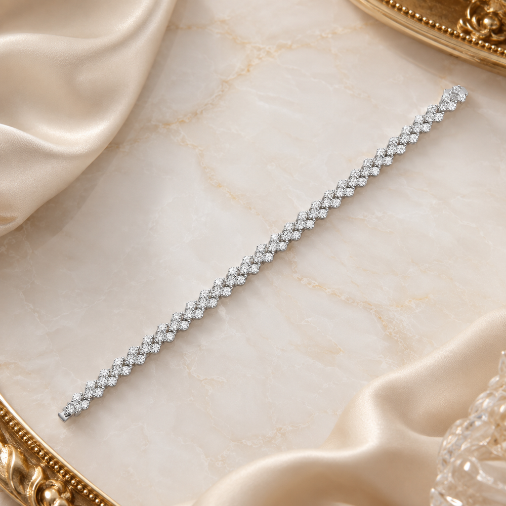 Full-length moissanite cluster bracelet displayed on ivory marble