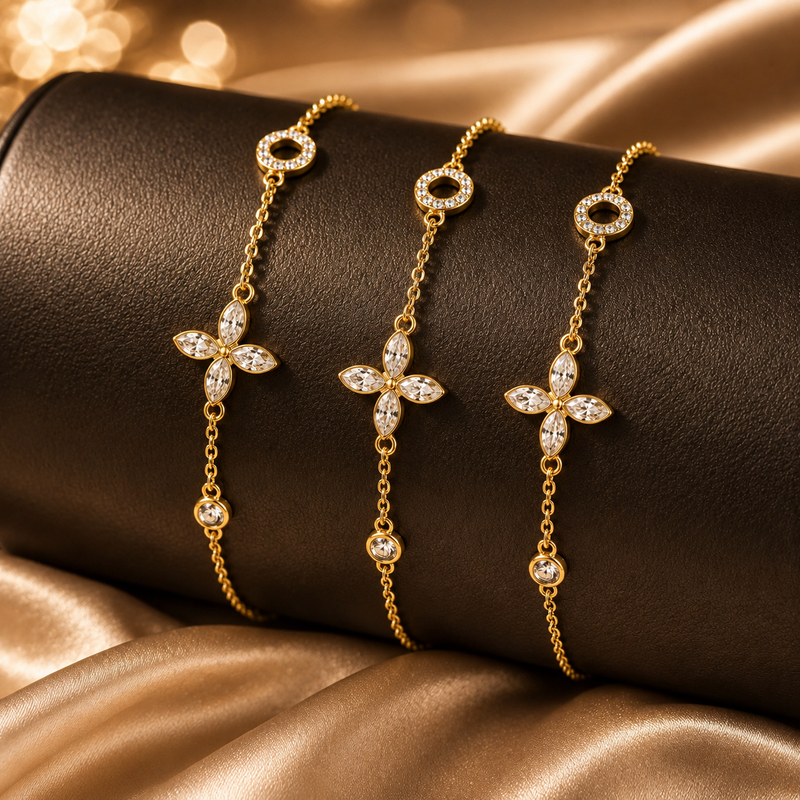 Close-up of marquise-cut moissanite clover centerpiece on gold bracelet