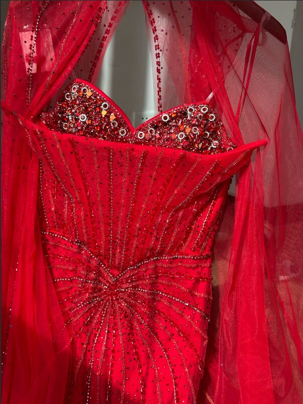 Client photo — Scarlet Sovereign Crystal Cape Gown